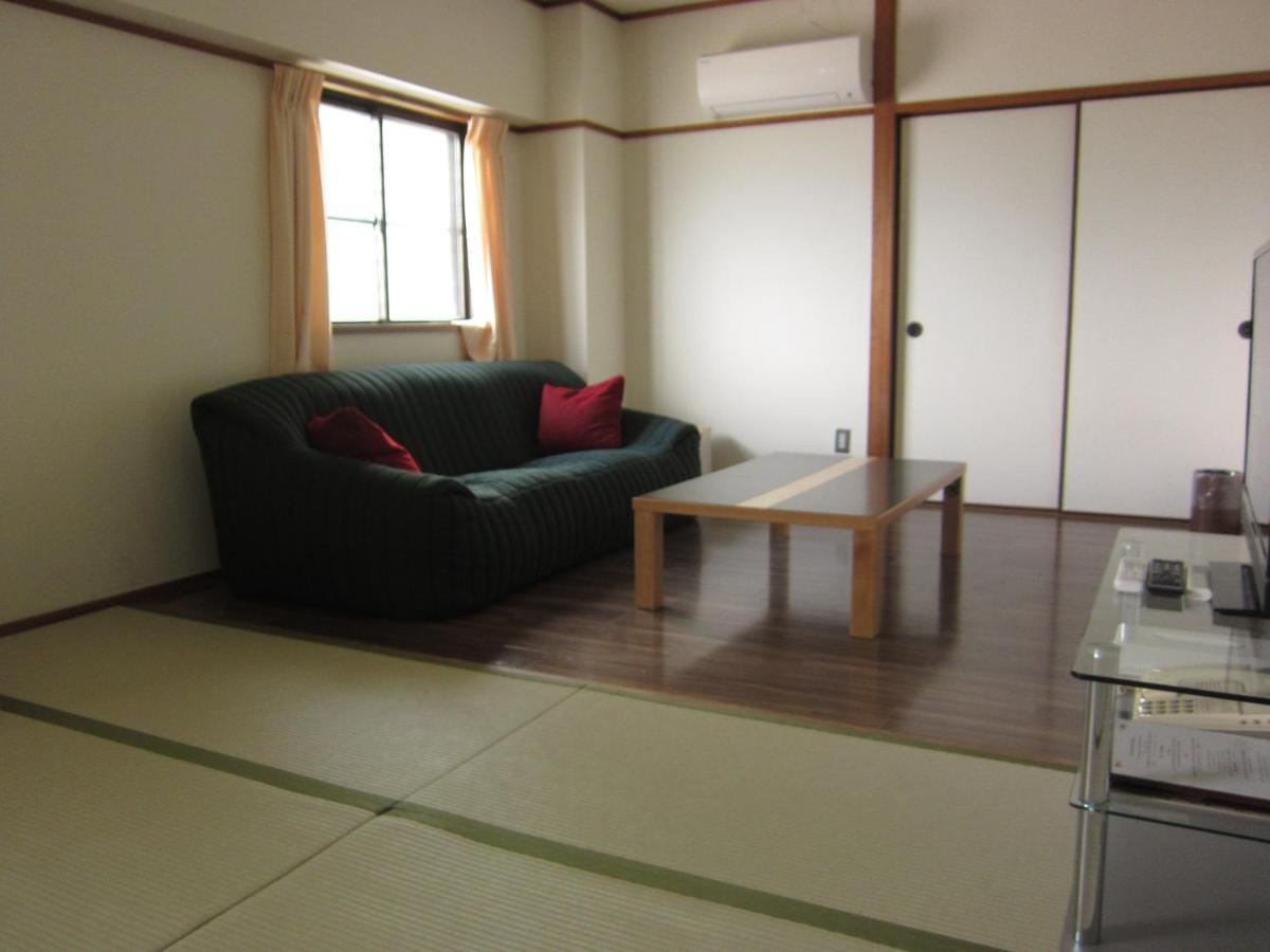 Hotel Sakuraya à Hatsukaichi Chambre photo